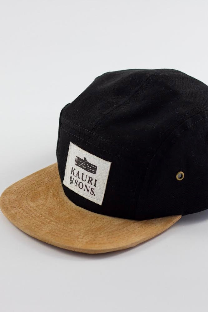Flat lay of Kauri &amp; Sons cap against white background