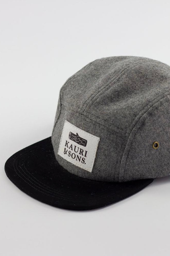 Flat lay of Kauri & Sons cap against white background